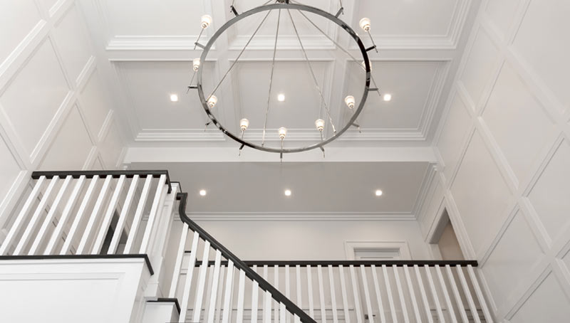 Hamptons Style Coffered Ceiling and Wall Treatment White Entry Stair