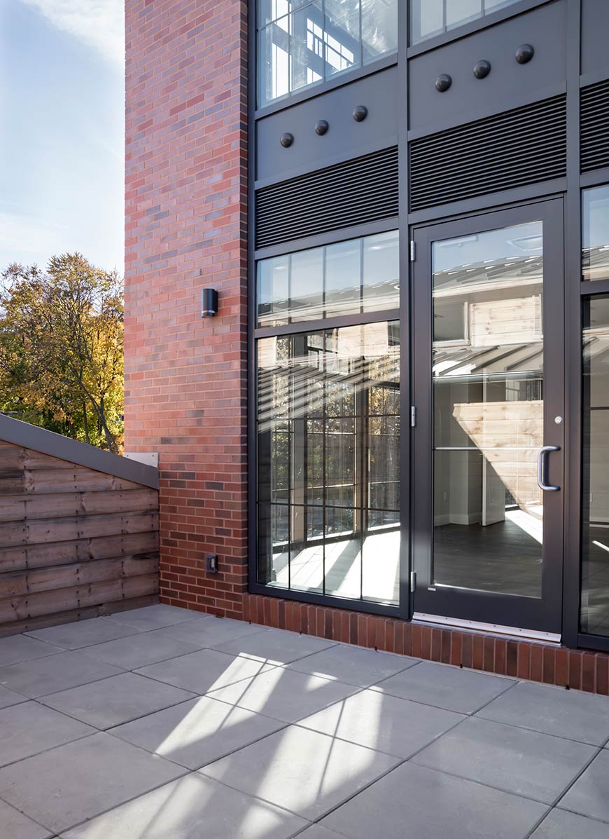 Apartment with Enclosed Brick Terrace Balcony